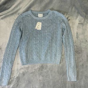 New With Tags On Light Sweater. Size Small